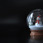 Snow globe with a snowman , snowman and green trees. Christmas snow globe - dark background - 3D rendering
